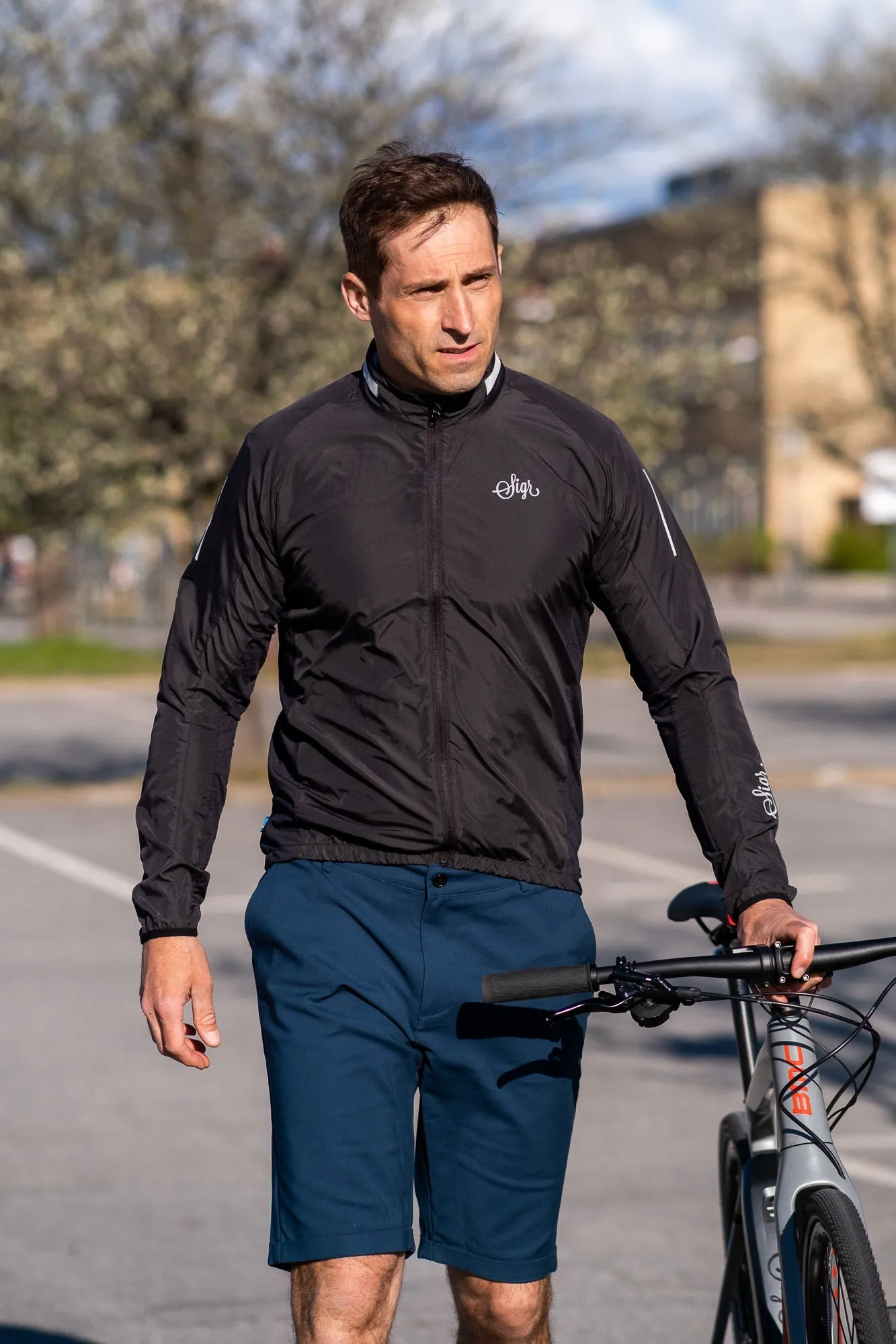 Treriksrset Black Men's Cycling Wind/Pack Jacket
