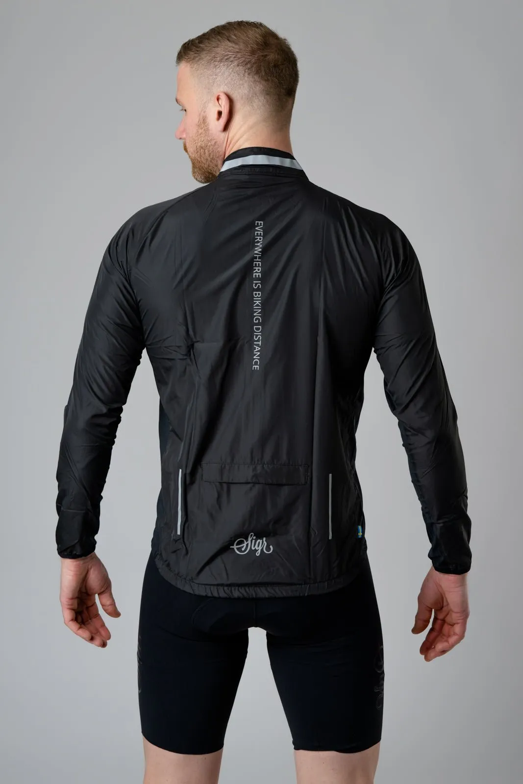 Treriksrset Black Men's Cycling Wind/Pack Jacket