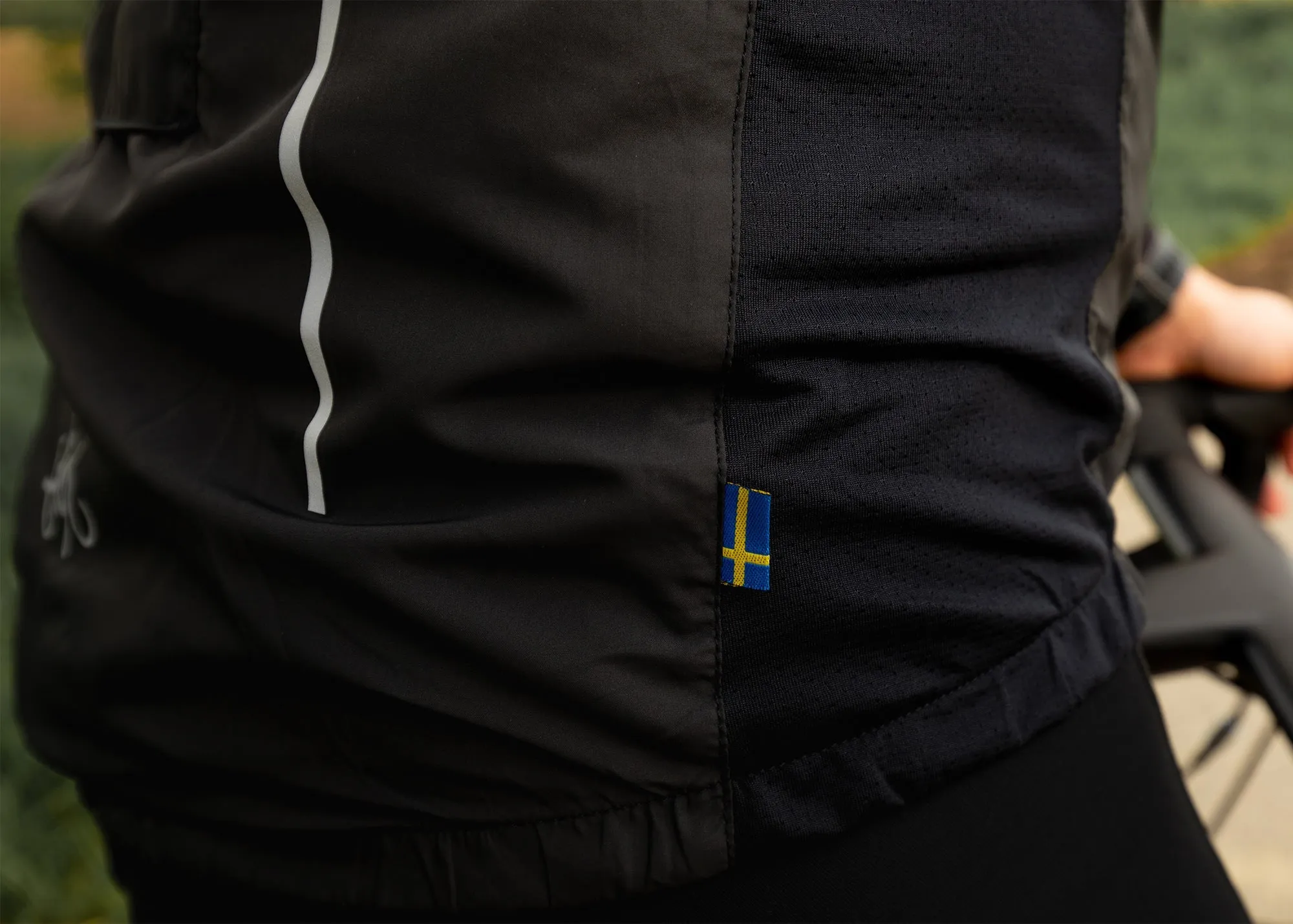 Treriksrset Black Men's Cycling Wind/Pack Jacket