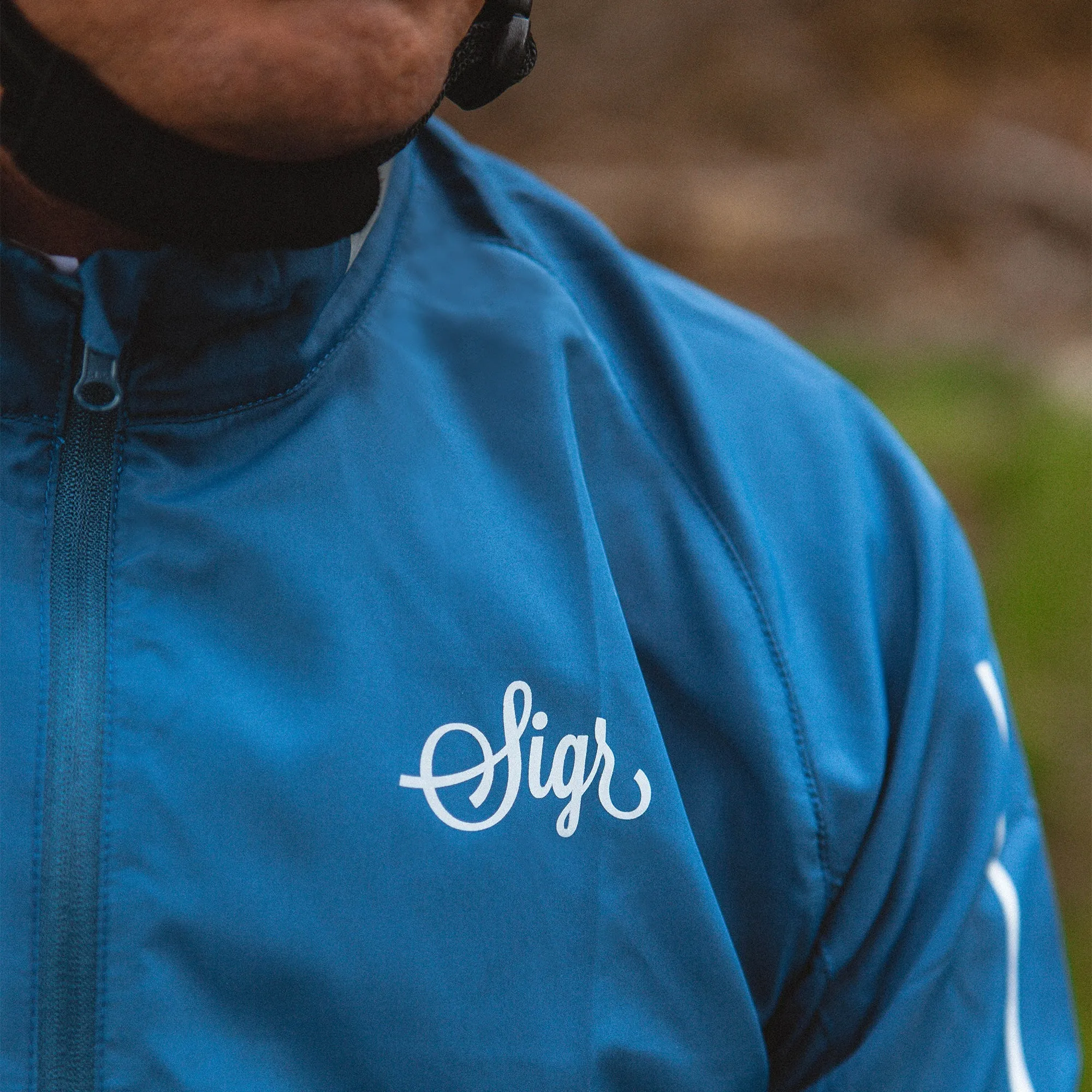Treriksrset Blue Men's Cycling Wind/Pack Jacket